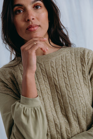 
                  
                    Donna cable knit top
                  
                