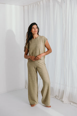 
                  
                    Donna cable knit top
                  
                