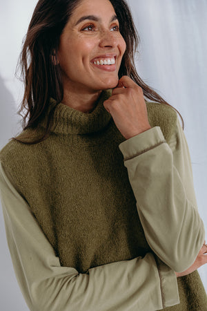 
                  
                    Dina high neck pullover
                  
                