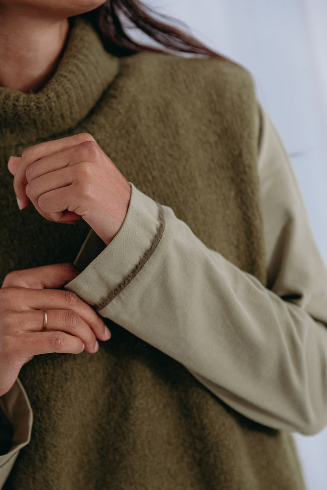 
                  
                    Dina high neck pullover
                  
                