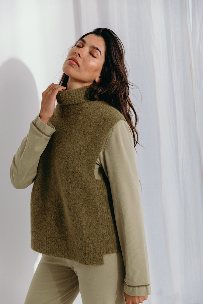 
                  
                    Dina high neck pullover
                  
                