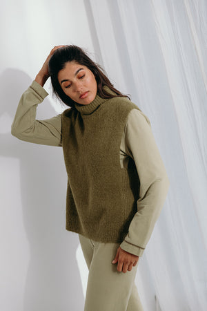
                  
                    Dina high neck pullover
                  
                