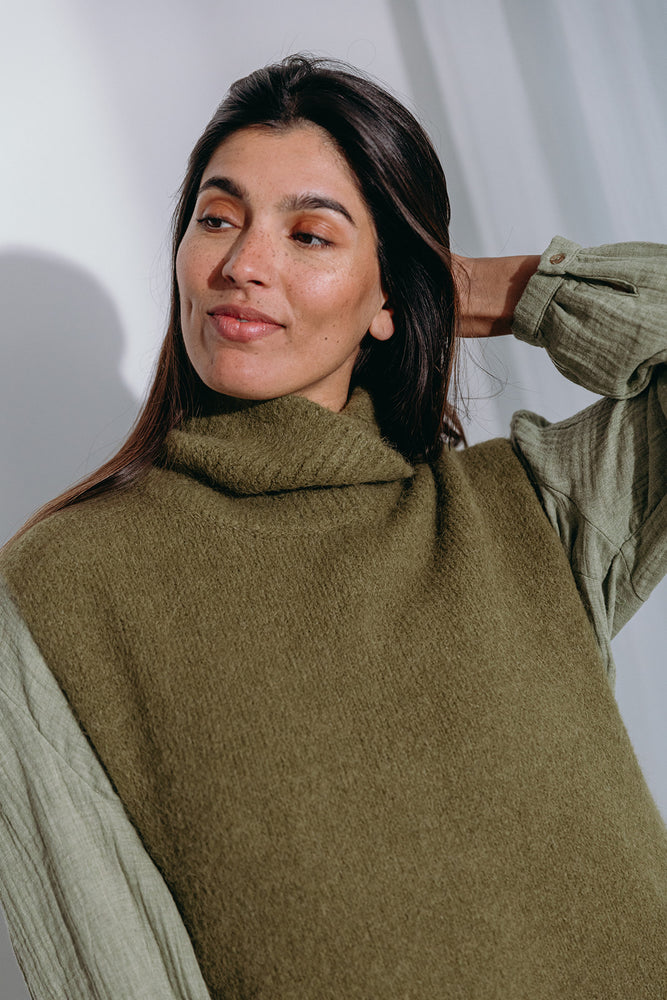 
                  
                    Dina high neck pullover
                  
                