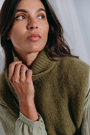 
                  
                    Dina high neck pullover
                  
                