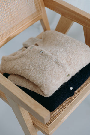 
                  
                    Dré bouclé knit cardigan
                  
                