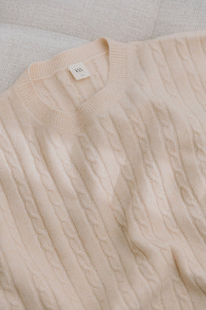 
                  
                    Donna cable knit top
                  
                