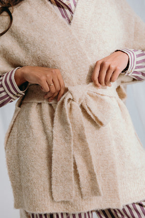 
                  
                    Dré bouclé knit wrapped jacket with belt
                  
                