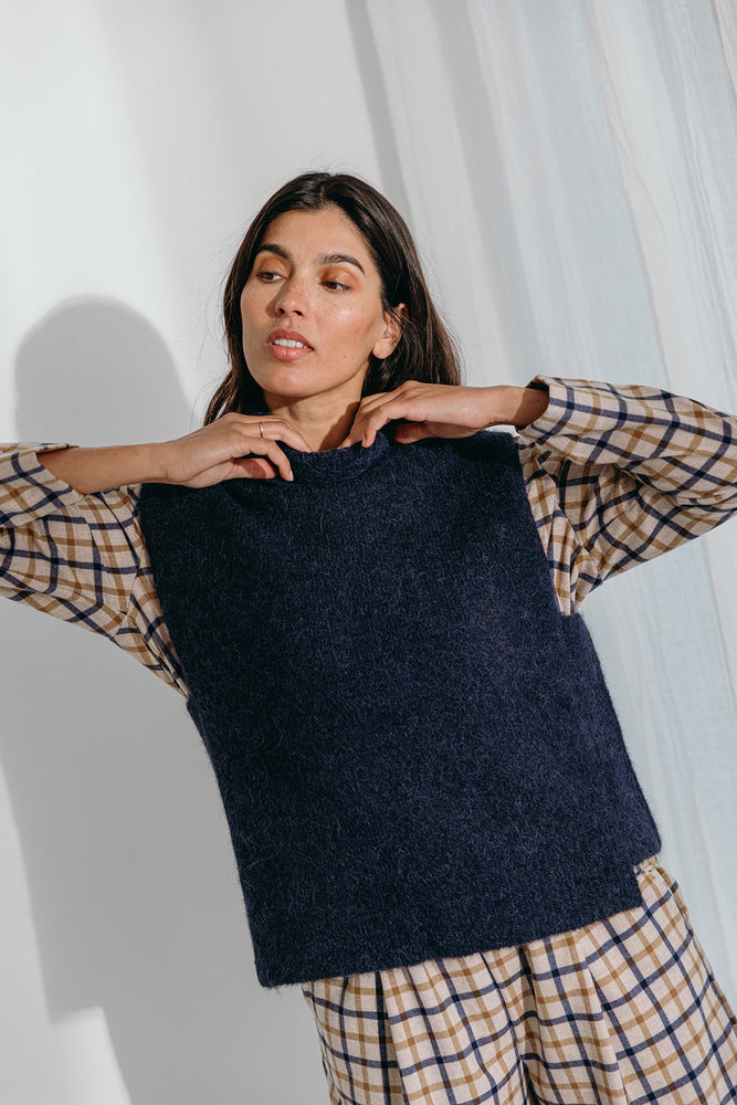 
                  
                    Dina high neck pullover
                  
                