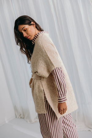 
                  
                    Dré bouclé knit wrapped jacket with belt
                  
                
