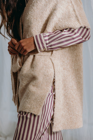 
                  
                    Dré bouclé knit wrapped jacket with belt
                  
                